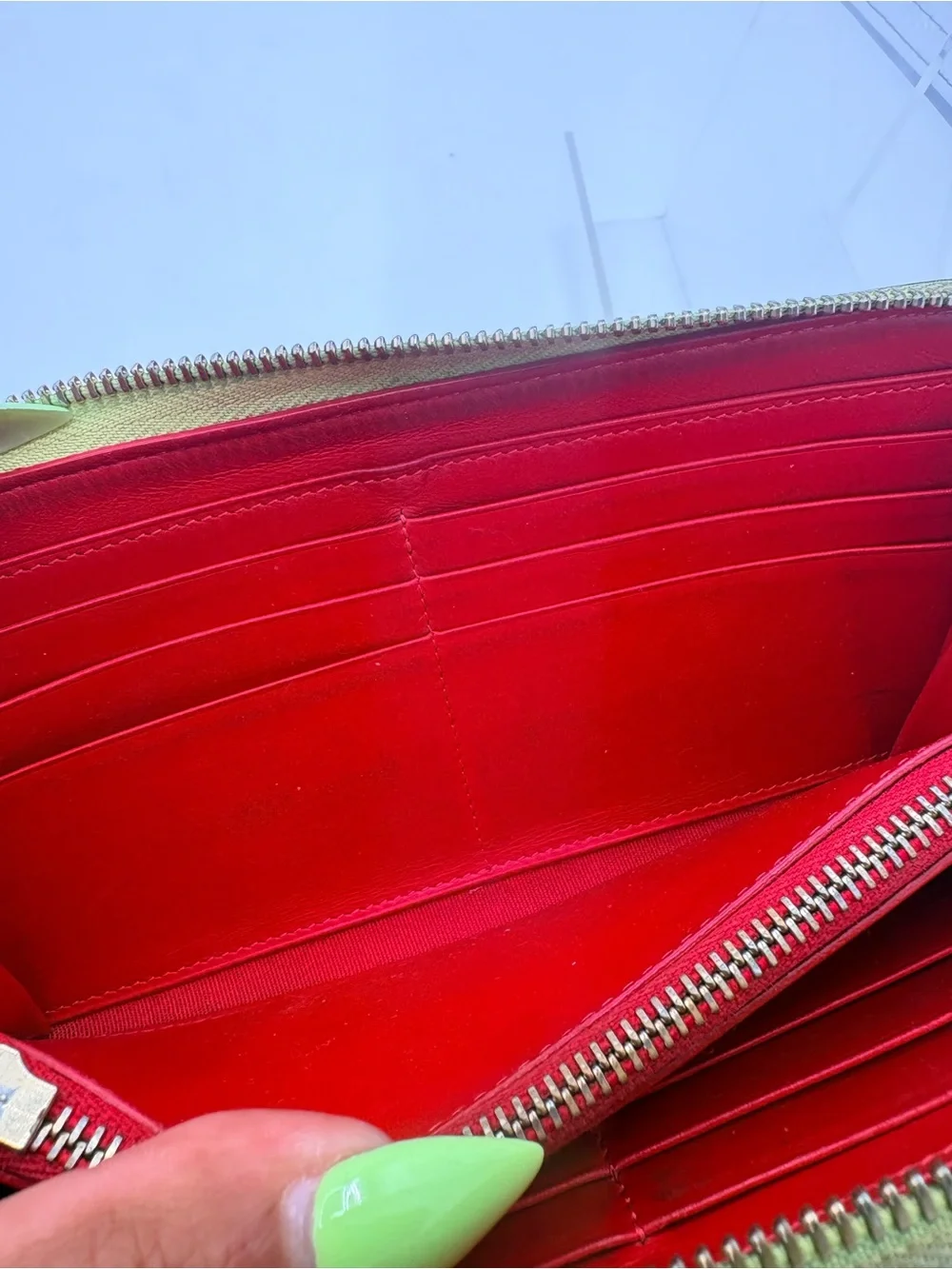 Christian Louboutin neon wallet